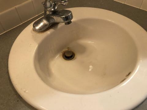 A Dirty Bathroom Sink.